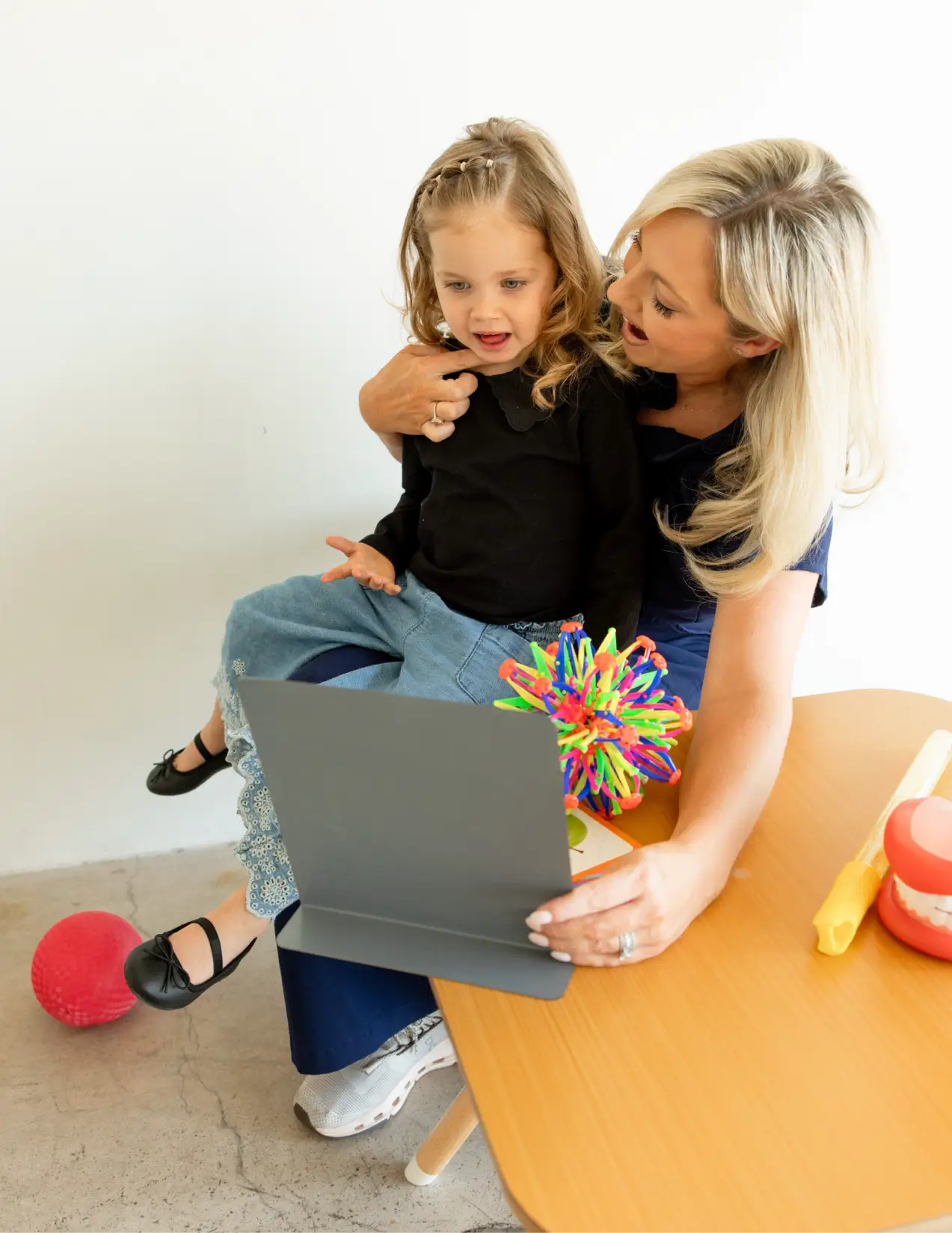 Haley working with a child in a therapy session at Speech Me Therapy